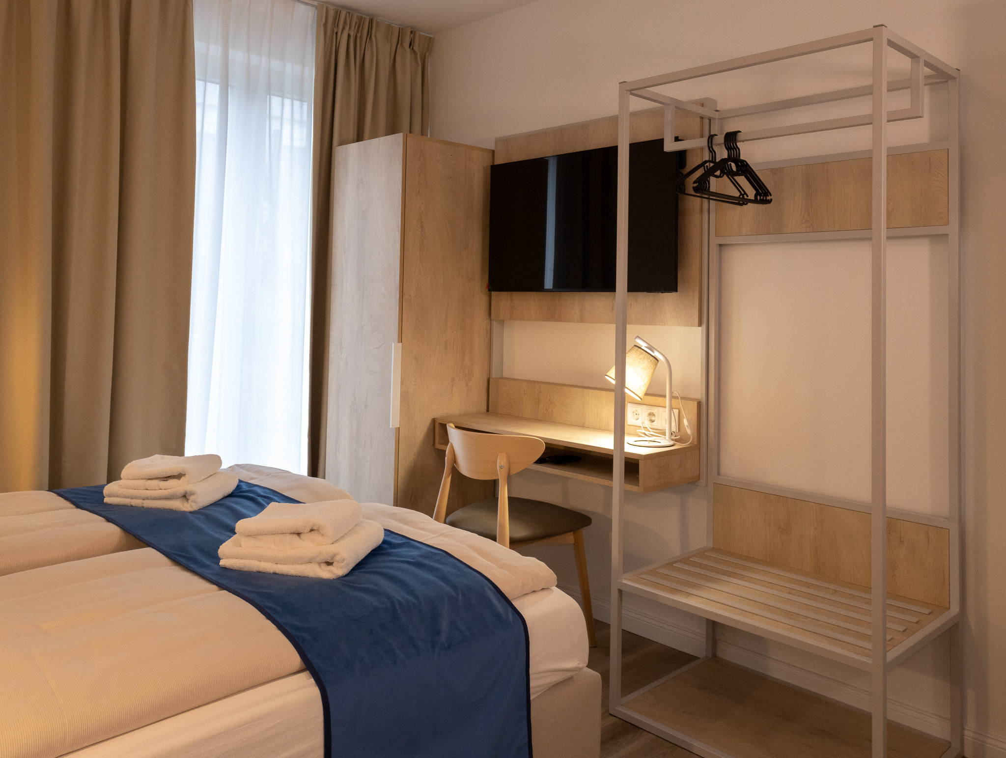 Doppelzimmer Kajüte – Schlafbereich im FairSchlafen Boutique Hotel