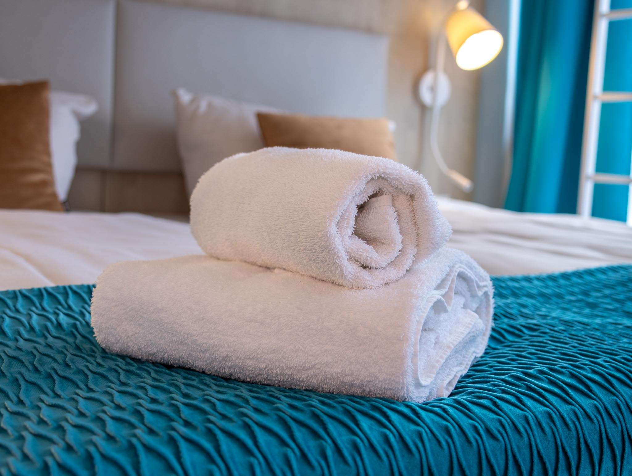Kapitänszimmer – frische Handtücher im FairSchlafen Boutique Hotel